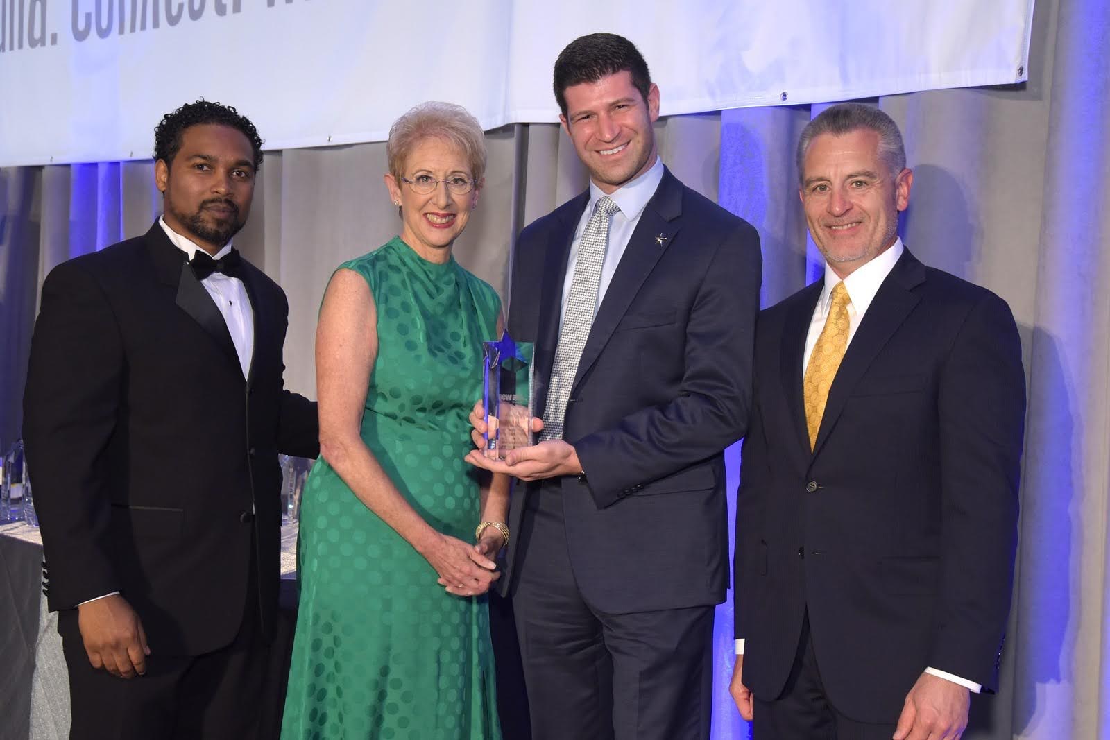 Dr. Goldwaser receiving a sports medicine award