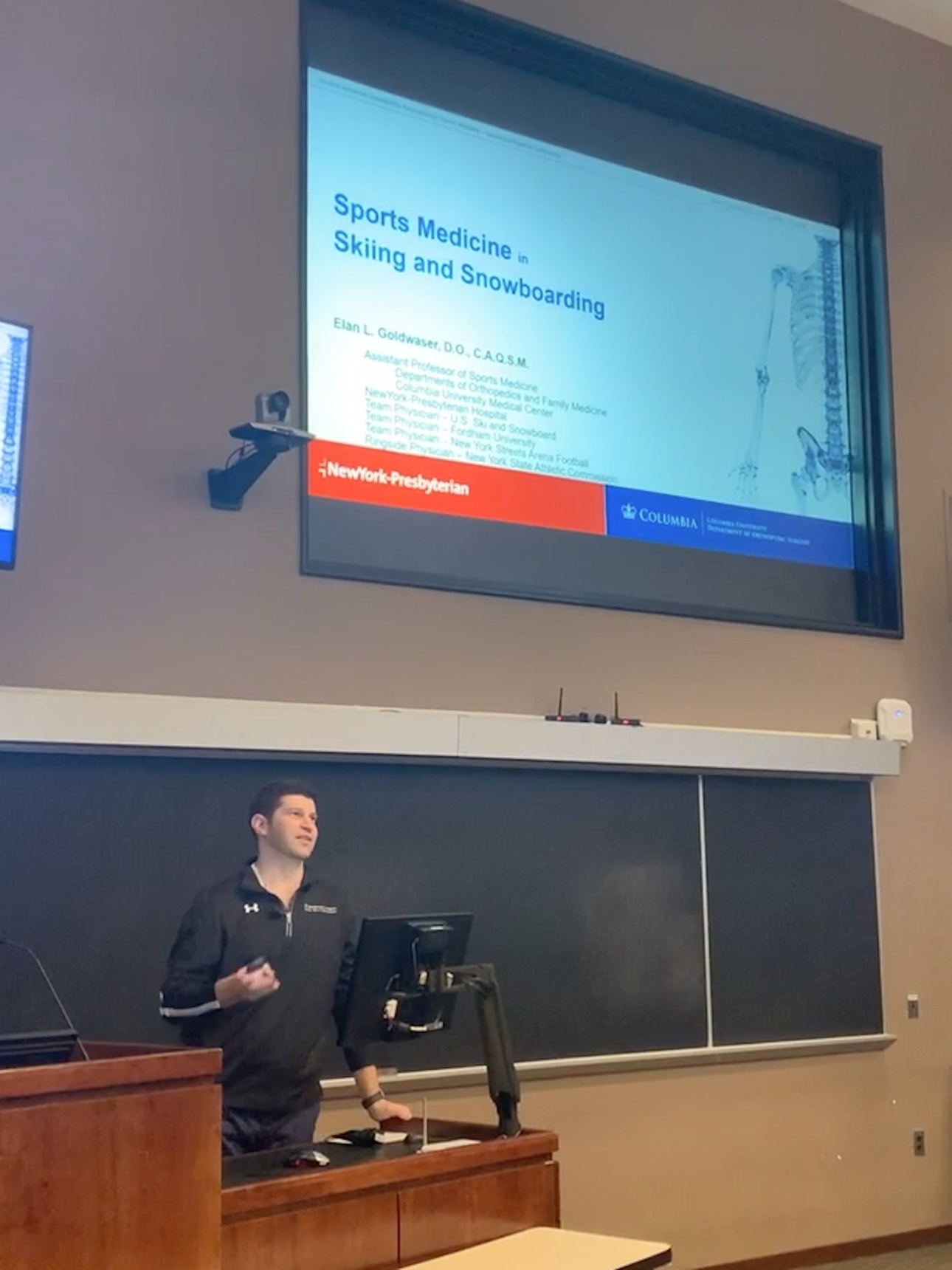 Dr. Goldwaser lecturing on sports medicine in skiing and snowboarding